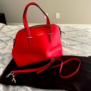 Beautiful - fire cracker red Kate Spade leather purse with cross body strap.